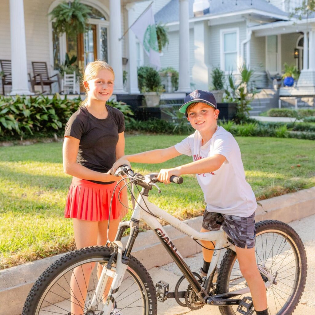 Teenager wearing Invisalign clear aligners from orthodontist in Mobile Alabama