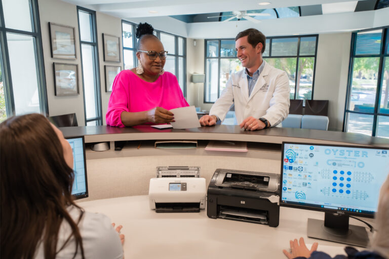 Orthodontist Mobile AL welcoming reception area with patient check-in at Oyster Orthodontics